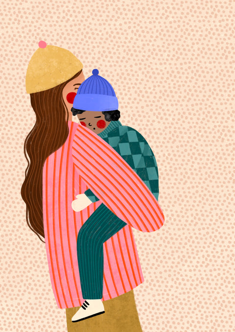 Mother holding child in her arms. Both are dressed in winter clothing with hats, against a beige dotted background.